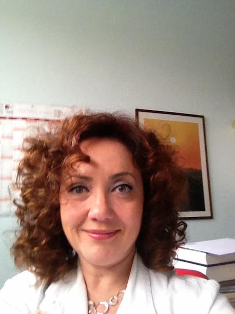 Ritratto professionale della Dottoressa Roberta Ravenni, neurologa e neurofisiologa